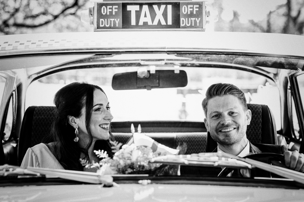Wedding Couple in Vintage Taxi 