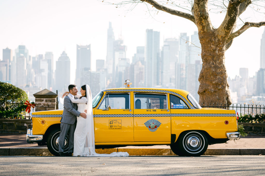 Including a vintage taxi in a holiday elopement in NYC is an unforgettable experience. 