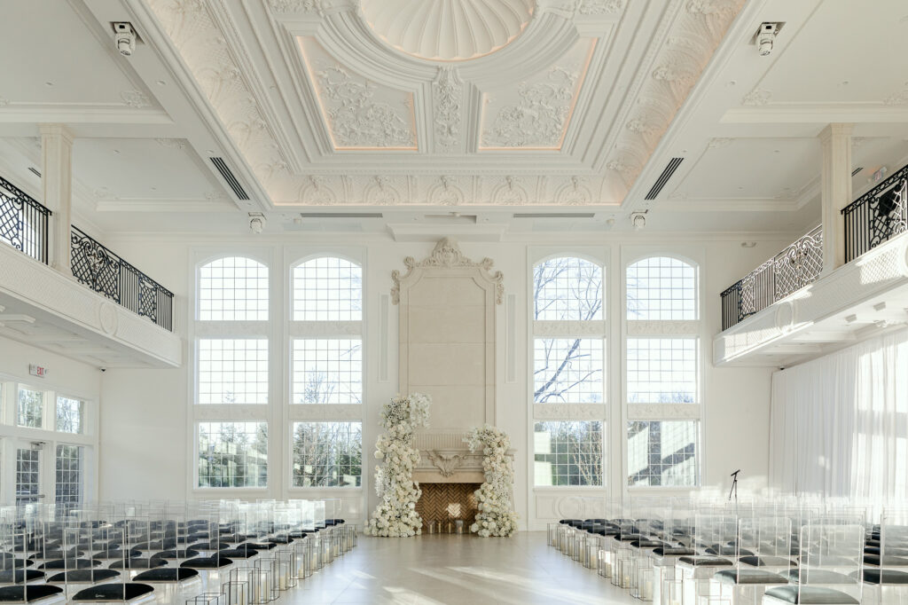 All white ceremony room at the Estate at Florentine Gardens 