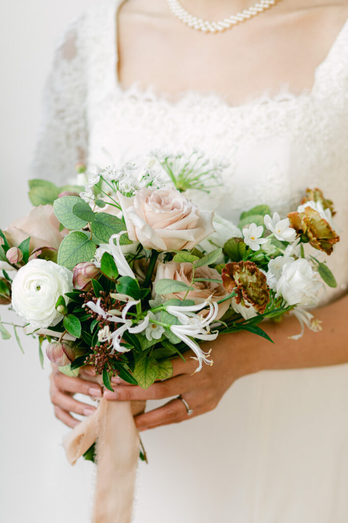 Wedding bouquet by Pink Jasmine Designs at the at the Wythe Penthouse loft.